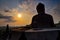 Buddhist statue facing the sun in Borobudur temple