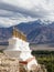 Buddhist stupa and Himalayas mountains. Shey Palace in Ladakh, India