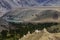 Buddhist Stupa, mound-like or hemispherical structure containing relics , used as a place of meditation. Green trees and Himalayan