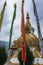 Buddhist stupa with religious pryer flags and cloudy sky at morning from low angle