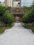 Buddhist temple gate, stairs and tree garden