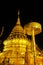 Buddhist temple golden pagoda of Doi Suthep at night