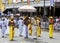 A Buddhist Temple Priest with ceremonial guards.