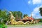 Buddhist temple surrounded by green garden