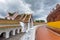 Buddhist temple in Thailand with walkway curved on overcast sky background,Marble and concrete design