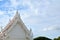 Buddhist Temple top of white roof and eaves public location in thailand