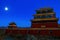 Buddhist Tibetan Temple at night under the Full Moon