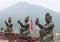 Buddhistic statues making offerings to the Big Buddha, Hong Kong