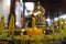 Buddhists make merit,Placing a lighted candle and lit incense with candles frame on the altar of Buddha at temple. Selective