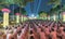 Buddhists toward stage during night ceremony Buddha Amitabha stage