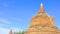 Buddist Stupa ancient red brick monument on a blue clear sky background