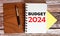 BUDGET 2024 text with calculator on the table, financial concept budget 2024, income, economic stability