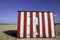 Budget vacation property. Striped beach hut.