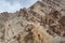 A Budha statue of a Tibetan traditional  temple near the Hemis monastery built at the hillside of barren mountains in Leh, Ladakh