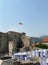 Budva. Flag of Montenegro on the Citadel roof top