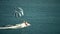 BUDVA, MONTENEGRO - JULY 26, 2018. Parasailing parachute and speedboat at sea
