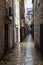 Budva, Montenegro. March 5, 2020. Ancient stone alleyway with shops and dwellings.