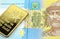 A bue and yellow one hryvnia note from Ukraine with a gold bar in macro