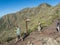 Buenavista del Norte, Tenerife, Canary islands, Spain, december 22, 2021: Hikers and tourists at signpost at hiking