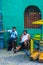 BUENOS AIRES / ARGENTINA - 05/04/2019: people have relax sitting next their street market in La Boca, Argentina
