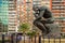 Buenos Aires, Argentina - The Thinker Statue by Rodin in front of Colorful Apartment Residential Buildings in Buenos Aires