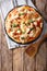 Buffalo pizza with chicken breast, tomato concasse and cheese cl