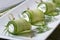 Buffet snacks: cucumber rolls with soft cheese