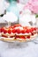 Buffet with sweets. Cakes with raspberries. Sweet table for banquets, weddings, parties