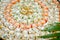 Buffet table. Sushi rolls laid out in a circle on a tray.