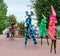 Buffoons on stilts during festival Slavic Bazaar, Vitebsk, Belarus