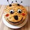 Bug-themed Cake With Expressive Facial Features For Halloween