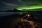 buggy car and northern lights beach. Neural network AI generated