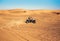 Buggy quad bike ride and drift at desert sand