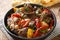 Buglama Traditional hot ragout with meat and vegetables closeup in the Bowl. Horizontal