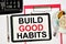 Build good habits. A text label in the planning notebook.