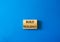 Build resilience symbol. Wooden blocks with words Build resilience. Beautiful blue background. Business and Build resilience