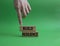 Build resilience symbol. Wooden blocks with words Build resilience. Beautiful green background. Businessman hand. Business and