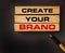 BUILD YOUR BRAND words on Wooden Blocks and luxury pen on black. Business Strategy and Marketing Concept