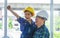 Builder Father holding son with engineering protecting hat for father day success concept