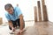 Builder Laying Wooden Flooring