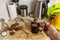 Builder making a cup of tea in his dirty kitchenette