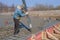 Builder pouring the foundation of a country house