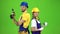 Builder standing a guy holding a drill, a girl hammer. Green screen