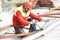 Builder worker assembling metal construction