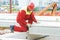 Builder worker installing concrete slab