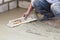 Builder worker preparing cement