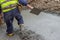 Builder worker walking on concrete