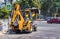 Builders repair the pavement with industrial equipment