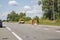 Builders repair the pavement with industrial equipment