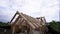 Builders working on construction of wooden cottage. Clip. Construction of wooden house of logs with working workers on